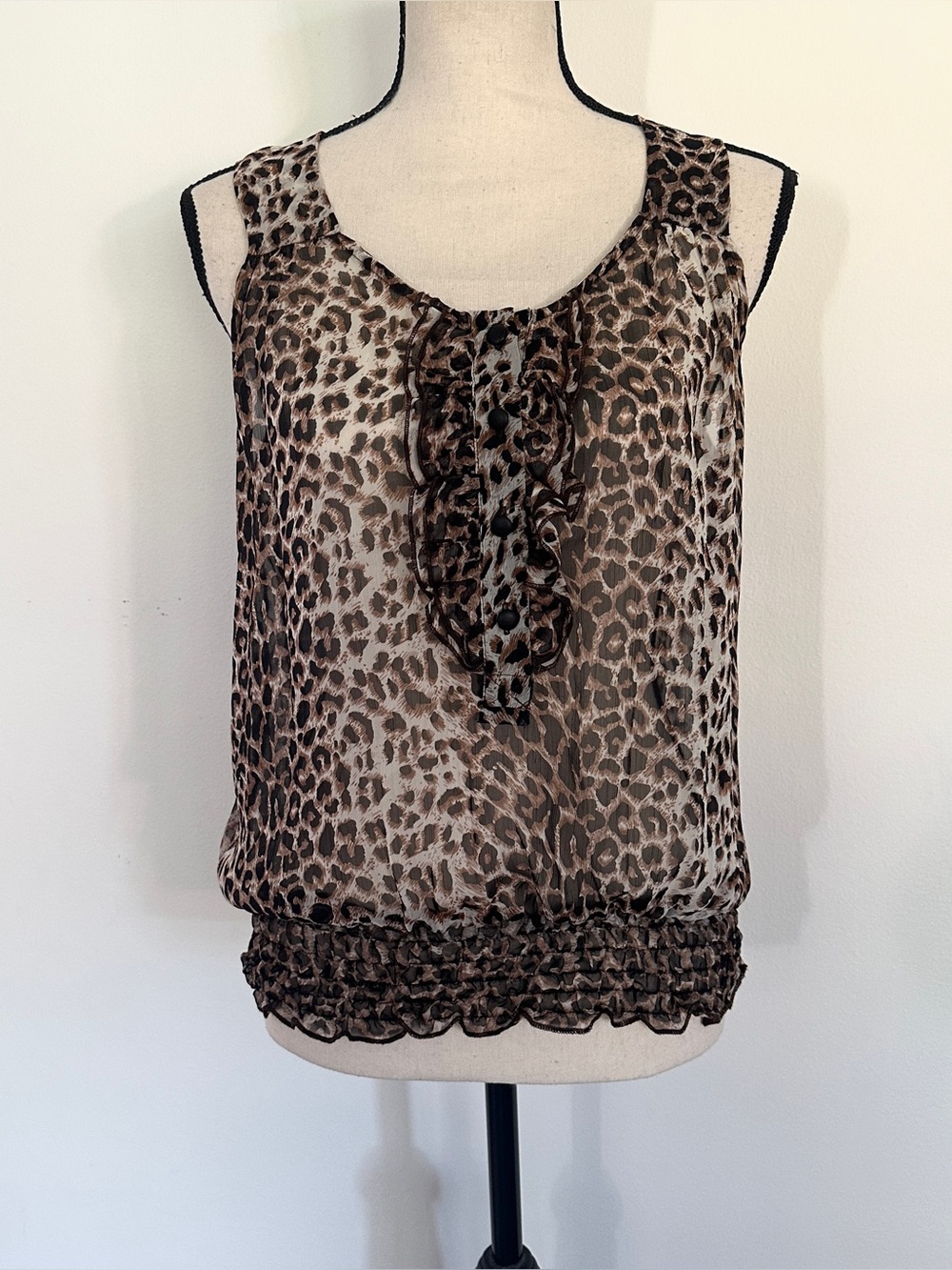 Sheer sleeveless leopard print blouse